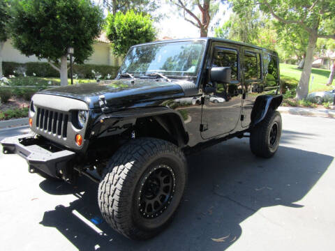 2013 Jeep Wrangler Unlimited for sale at E MOTORCARS in Fullerton CA