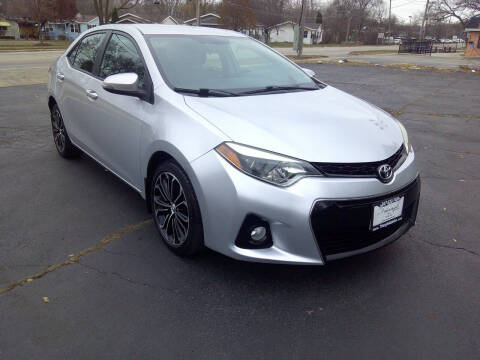 2015 Toyota Corolla for sale at Triangle Auto Sales in Elgin IL