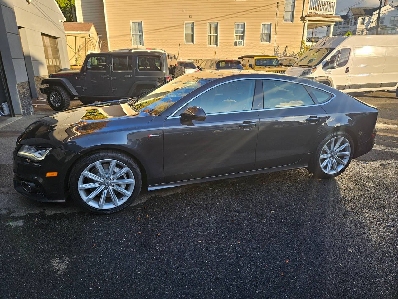 2014 Audi A7 for sale at RENOS AUTO SALES LLC in Waterbury, CT