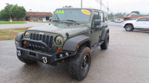 2009 Jeep Wrangler Unlimited for sale at RIVERSIDE CUSTOM AUTOMOTIVE in Mc Minnville TN