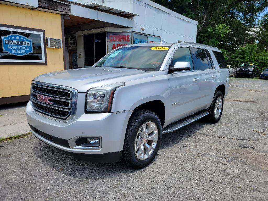 2016 GMC Yukon for sale at DAGO'S AUTO SALES LLC in Dalton, GA