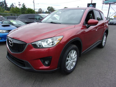 2013 Mazda CX-5 for sale at MERICARS AUTO NW in Milwaukie OR