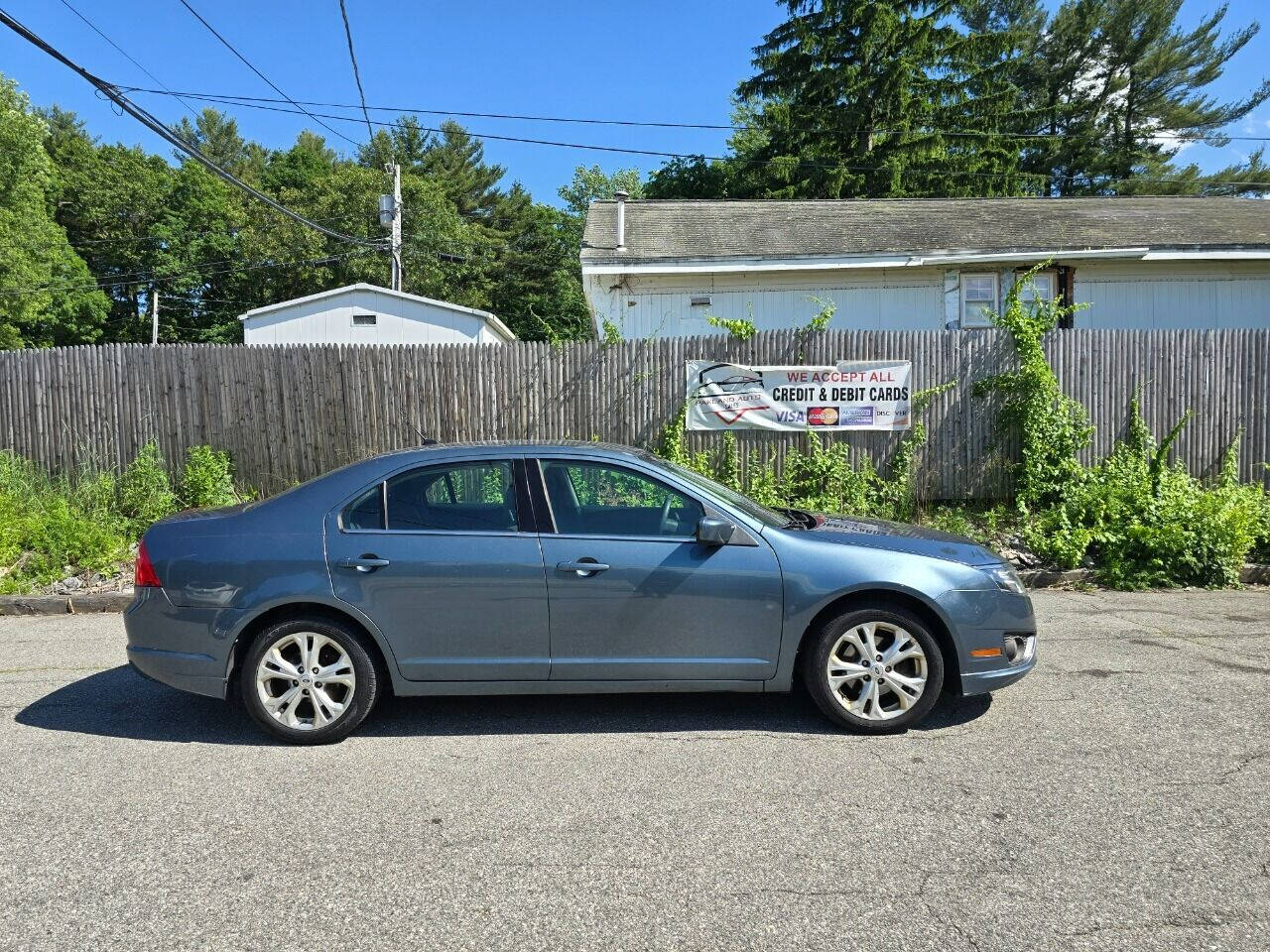 2012 Ford Fusion for sale at PAKLAND AUTO SALES in Auburn, MA