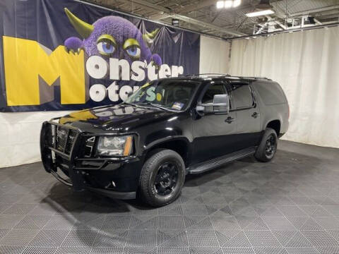 2014 Chevrolet Suburban for sale at Monster Motors in Michigan Center MI