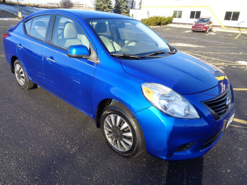 2014 Nissan Versa for sale at Oshkosh Auto Sales by Extreme Customs in Oshkosh WI