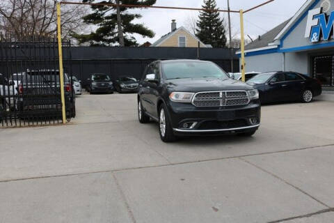2014 Dodge Durango for sale at F & M AUTO SALES in Detroit MI