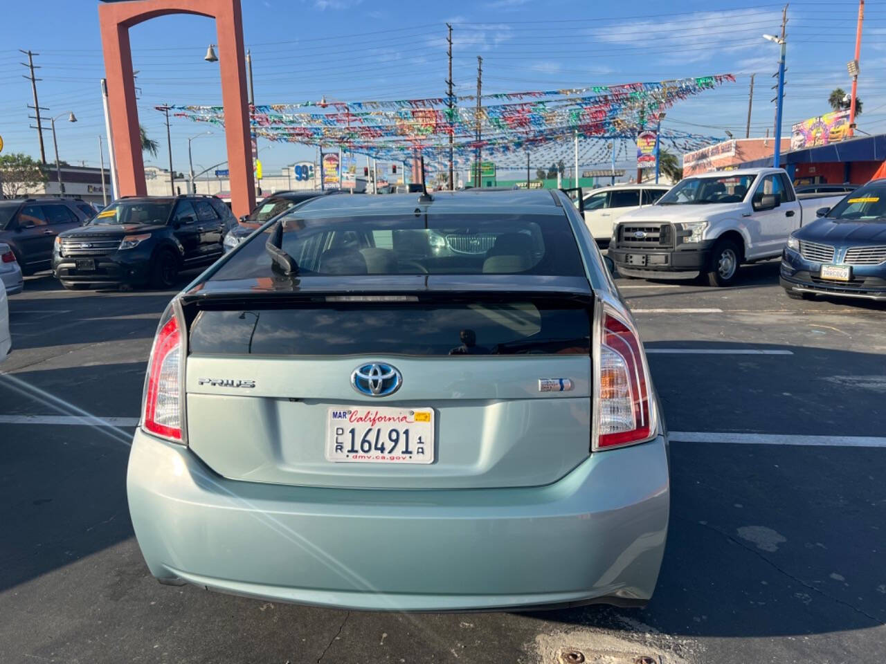 2012 Toyota Prius for sale at Unique Auto Sales, Inc. in Bell, CA