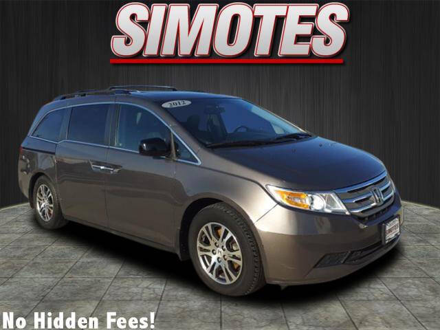 2012 Honda Odyssey for sale at SIMOTES MOTORS in Minooka IL