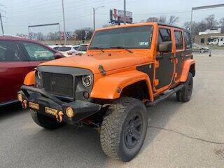 2012 Jeep Wrangler Unlimited for sale at Car Depot in Detroit MI