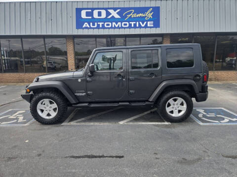 2010 Jeep Wrangler Unlimited for sale at Cox Family Automotive Inc in Lumberton NC