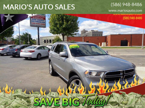 2014 Dodge Durango for sale at MARIO'S AUTO SALES in Mount Clemens MI