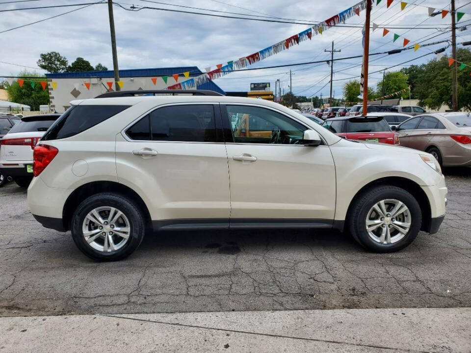 2014 Chevrolet Equinox for sale at DAGO'S AUTO SALES LLC in Dalton, GA