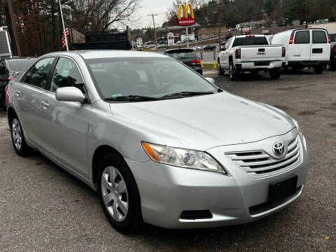 2009 Toyota Camry for sale at J & E AUTOMALL in Pelham NH