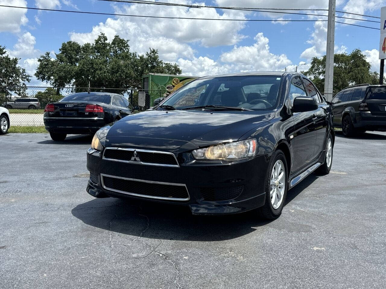 2012 Mitsubishi Lancer for sale at NOVA AUTO SALES in Orlando, FL