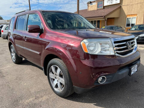 2013 Honda Pilot for sale at BERKENKOTTER MOTORS in Brighton CO