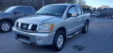 2006 Nissan Titan for sale at GEORGIA AUTO DEALER LLC in Buford GA