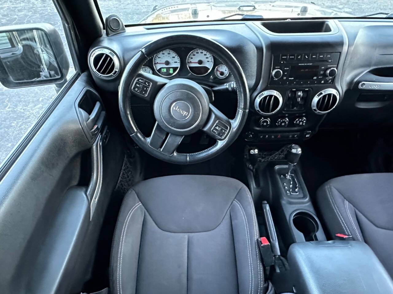 2013 Jeep Wrangler Unlimited for sale at Prompt Luxury Cars LLC in Austell, GA