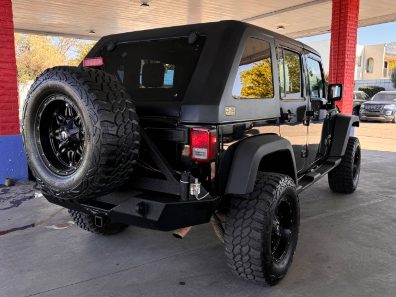 2010 Jeep Wrangler Unlimited for sale at IBAX AUTOMOTIVE LLC in Albuquerque, NM