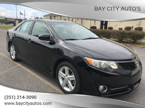 2012 Toyota Camry for sale at Bay City Auto's in Mobile AL