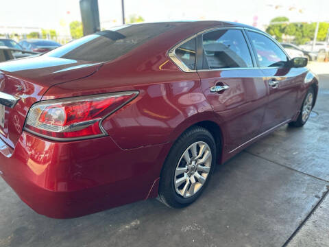 2015 Nissan Altima for sale at Buy-Fast Autos in Houston TX