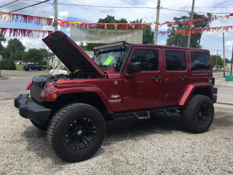 2011 Jeep Wrangler Unlimited for sale at Antique Motors in Plymouth IN