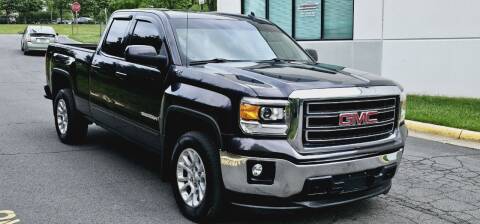 2014 GMC Sierra 1500 for sale at BOOST MOTORS LLC in Sterling VA