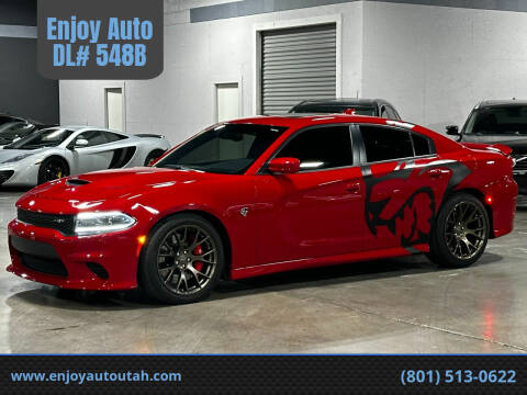 2015 Dodge Charger for sale at Enjoy Auto  DL# 548B in Midvale UT