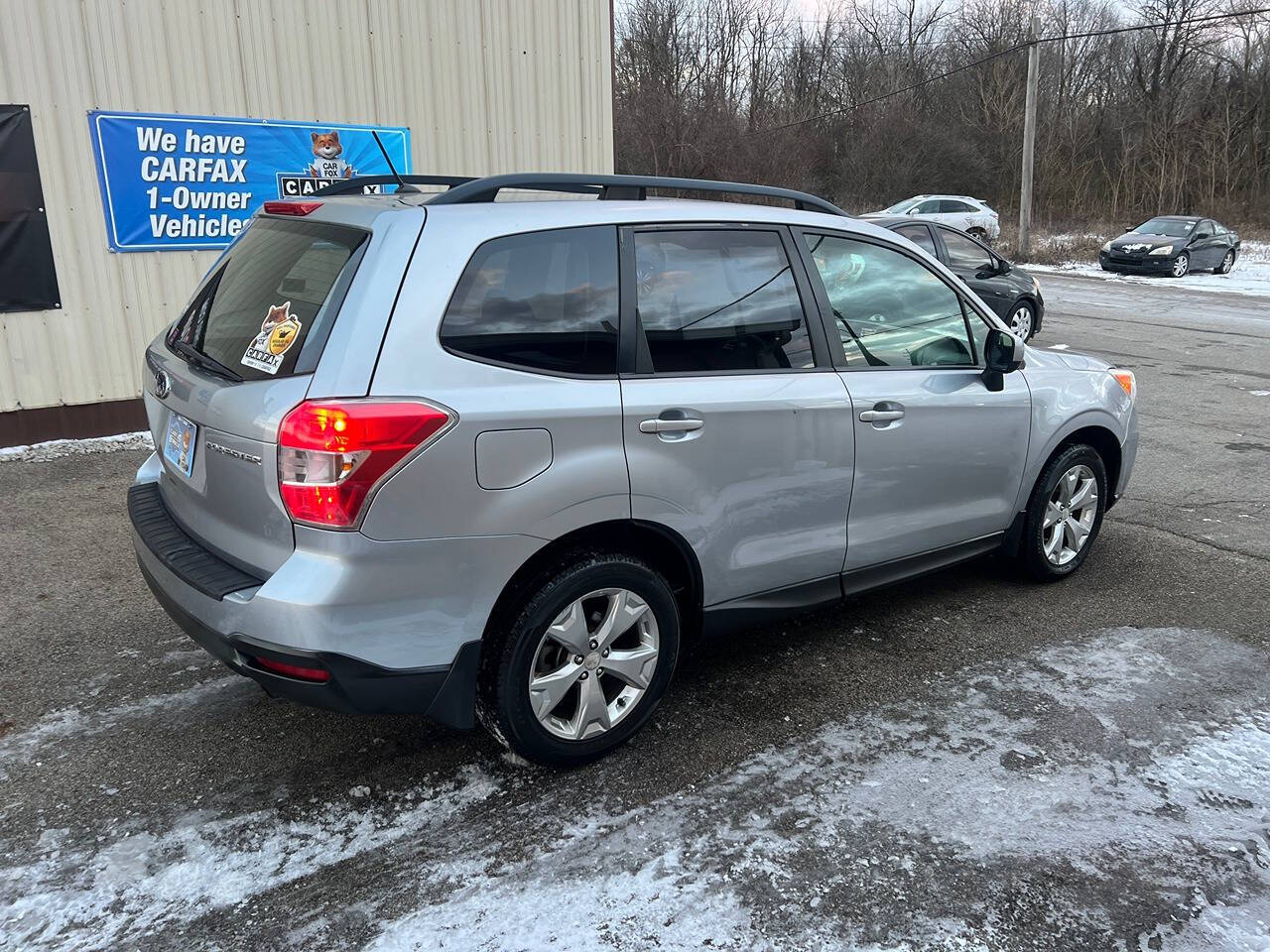 2014 Subaru Forester for sale at BNM AUTO GROUP in GIRARD, OH