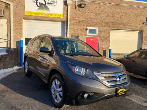 2013 Honda CR-V for sale at Godwin Motors inc in Silver Spring MD