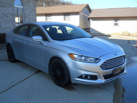 2016 Ford Fusion for sale at C.J. Lensing Motors Inc in Decorah IA