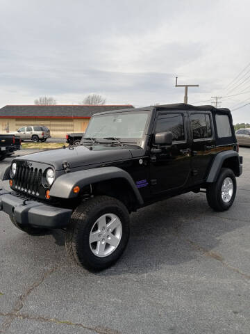2013 Jeep Wrangler Unlimited for sale at PRESTIGE MOTORCARS INC in Anderson SC