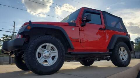 2016 Jeep Wrangler for sale at Gocarguys.com in Houston TX