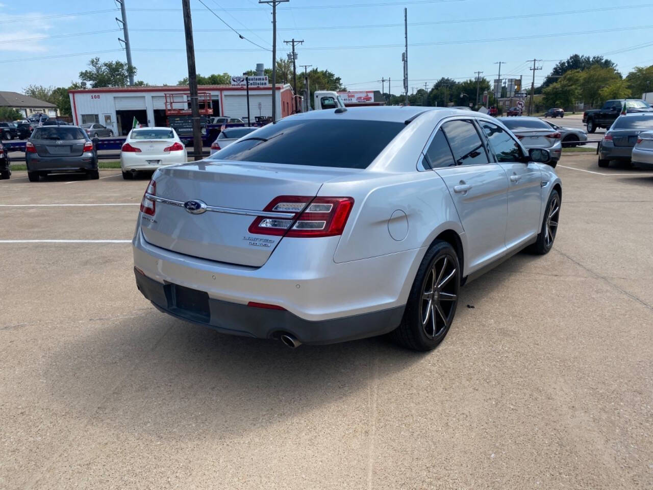 2015 Ford Taurus for sale at NTX Autoplex in Garland, TX