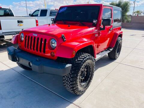 2014 Jeep Wrangler for sale at A AND A AUTO SALES in Gadsden AZ