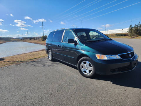 2001 Honda Odyssey for sale at BOOST MOTORS LLC in Sterling VA