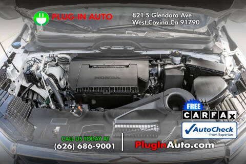 2023 Honda Pilot EX-L w/Rear Captain's Chairs