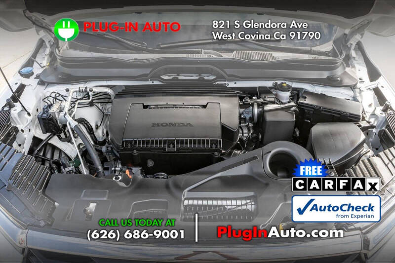 2023 Honda Pilot EX-L w/Rear Captain's Chairs