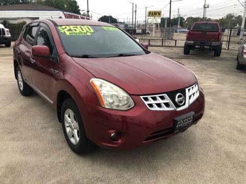 2013 Nissan Rogue for sale at RAW FINANCIAL in Houston TX