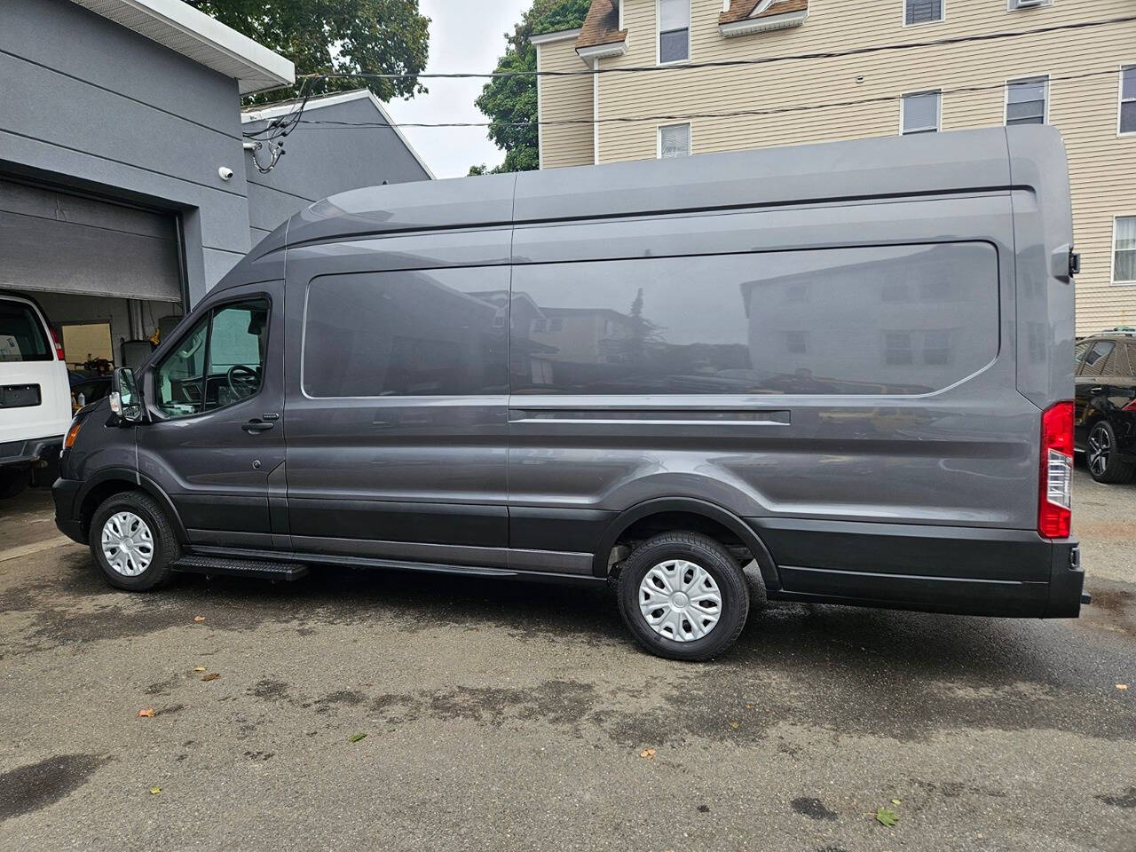 2023 Ford E-Transit for sale at RENOS AUTO SALES LLC in Waterbury, CT