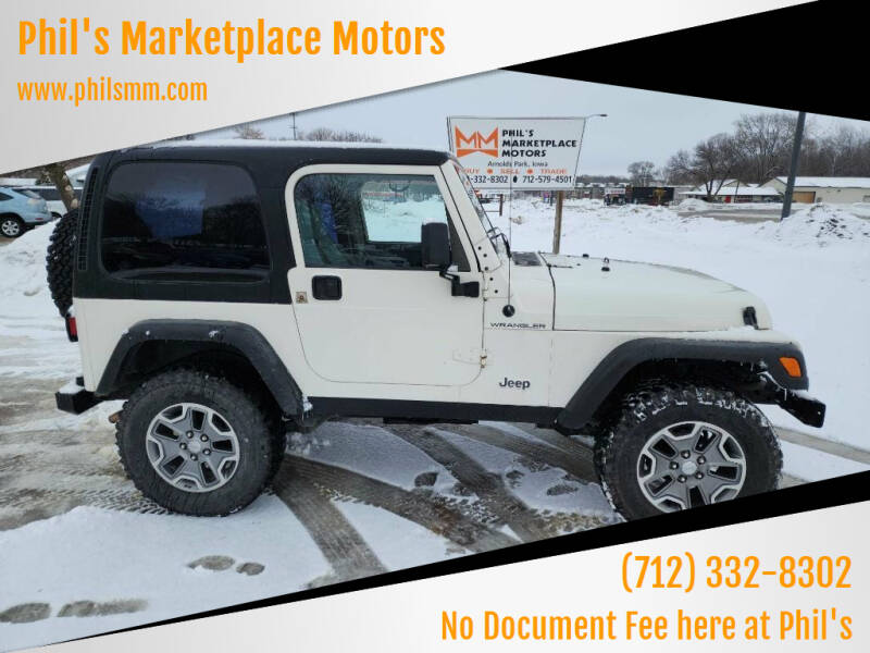 1997 Jeep Wrangler for sale at Phil's Marketplace Motors in Arnolds Park IA