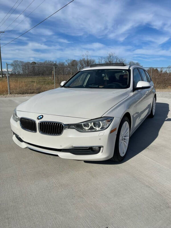2014 BMW 3 Series for sale at Powerhouse Auto in Smithfield NC