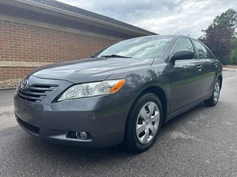 2009 Toyota Camry for sale at Minnix Auto Sales LLC in Cuyahoga Falls OH