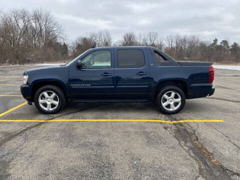 2007 Chevrolet Avalanche for sale at Caruzin Motors in Flint MI