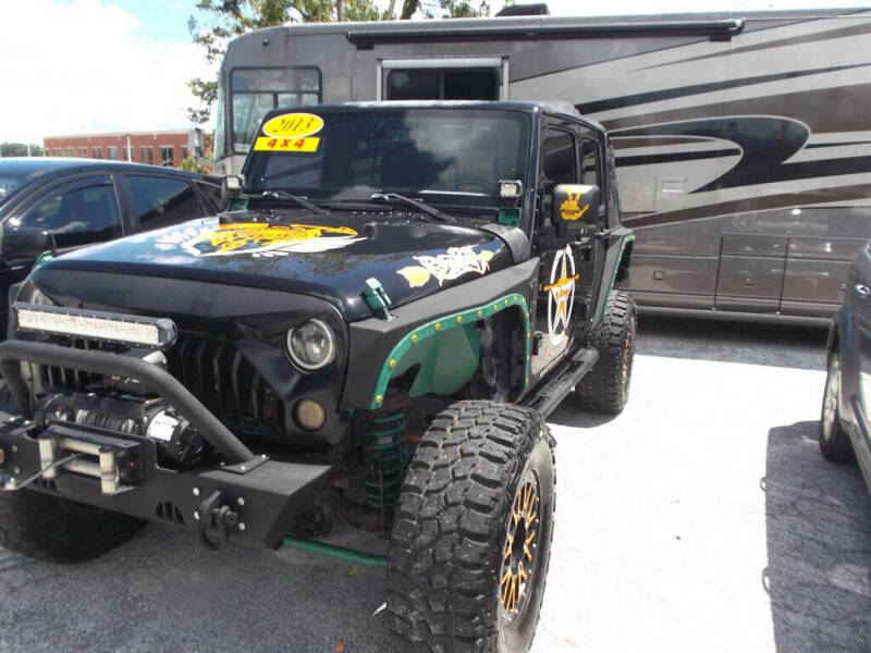 2013 Jeep Wrangler Unlimited for sale at plant city truck and rv sales llc in Plant City FL