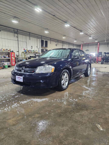 2014 Dodge Avenger for sale at WESTSIDE GARAGE LLC in Keokuk IA