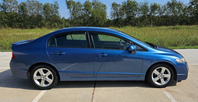 2011 Honda Civic for sale at CAR MARKET AUTO GROUP in Sugar Land, TX