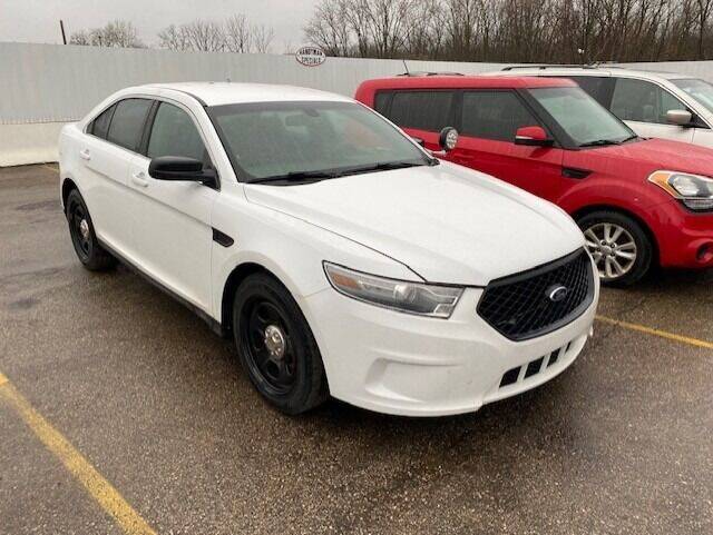 2014 Ford Taurus for sale at WELLER BUDGET LOT in Grand Rapids MI
