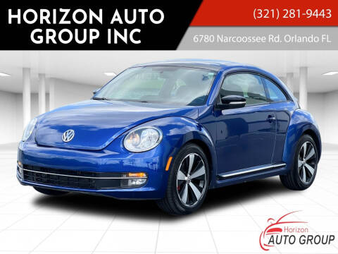 2013 Volkswagen Beetle for sale at HORIZON AUTO GROUP INC in Orlando FL