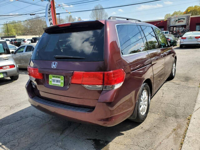 2010 Honda Odyssey for sale at DAGO'S AUTO SALES LLC in Dalton, GA