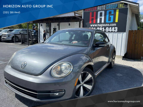 2012 Volkswagen Beetle for sale at HORIZON AUTO GROUP INC in Orlando FL